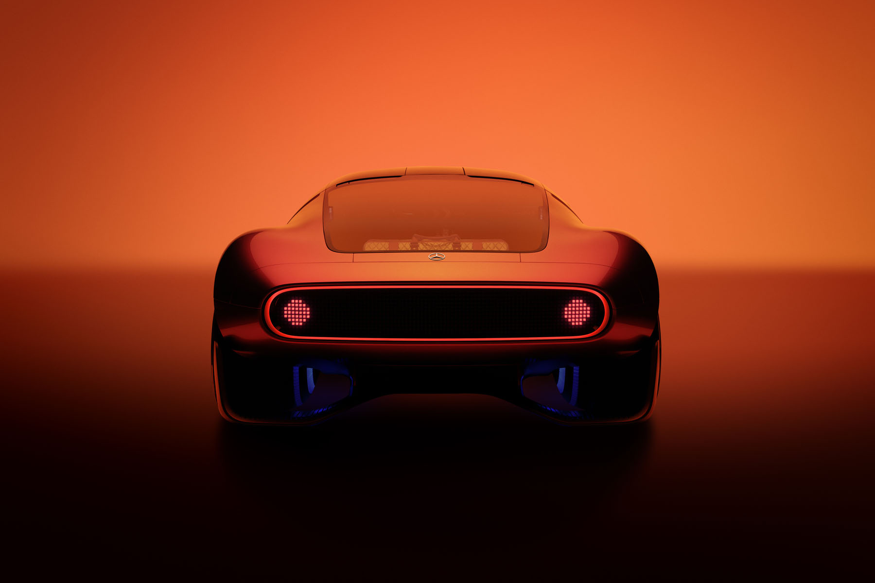 Mercedes-Benz Vision One-Eleven from the rear, with a black pixel display band framed by a red light outline and two round pixelated red taillights, set into smooth bodywork