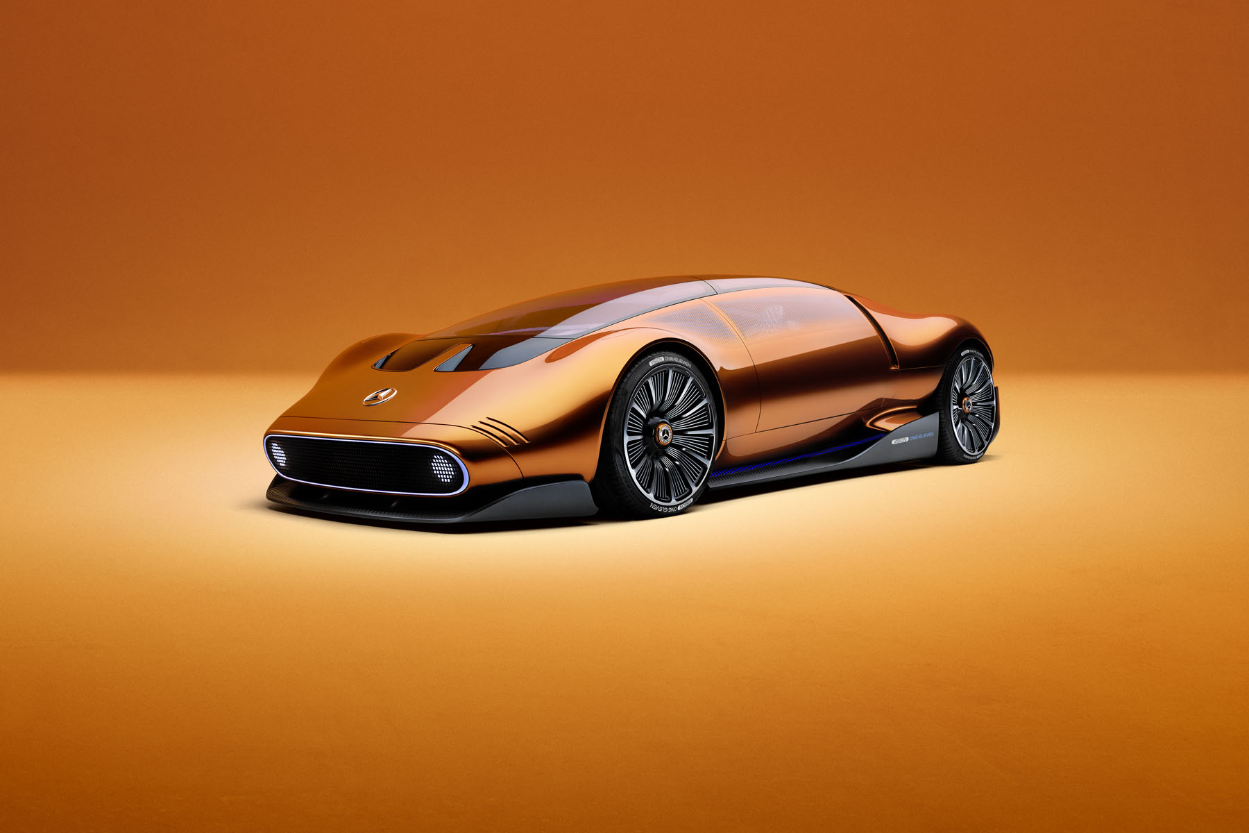 Mercedes-Benz Vision One-Eleven concept in copper orange, with a black pixel display panel across the front framed by a thin light outline